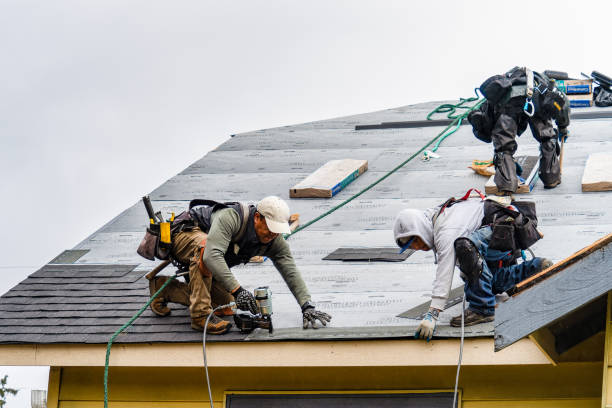 Professional Gutter Installation technician working in Richmond, MO